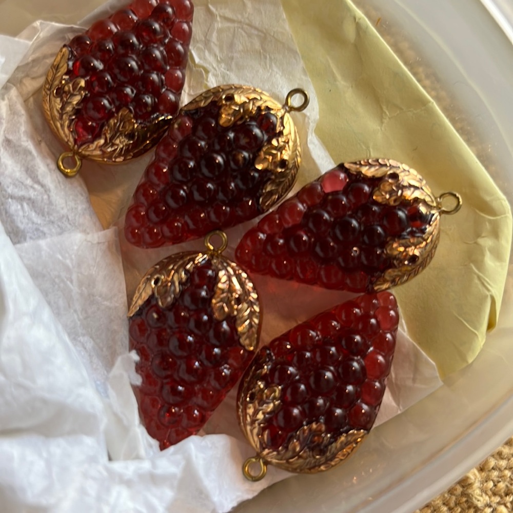 Raspberry crystal beads. Beautiful raspberry color with a gold detail hook.